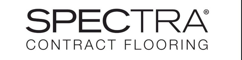 Modern office space with sleek commercial flooring solutions, featuring polished concrete floors and minimalist furniture.